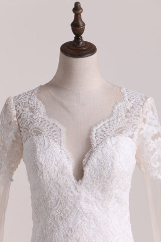 2024 Une ligne scoop manches longues robes de mariée en tulle avec appliques