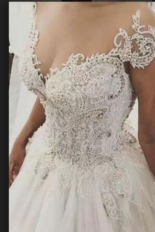 2024 Robes de mariée fantastiques Robe de bal à encolure dégagée Tulle avec appliques Longueur de plancher