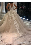 Robe de mariée en organza chatoyante avec décolleté en V et paillettes décorées