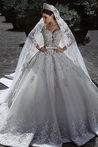 2024 manches longues une ligne de robes de mariée en tulle avec Applique et ceinture